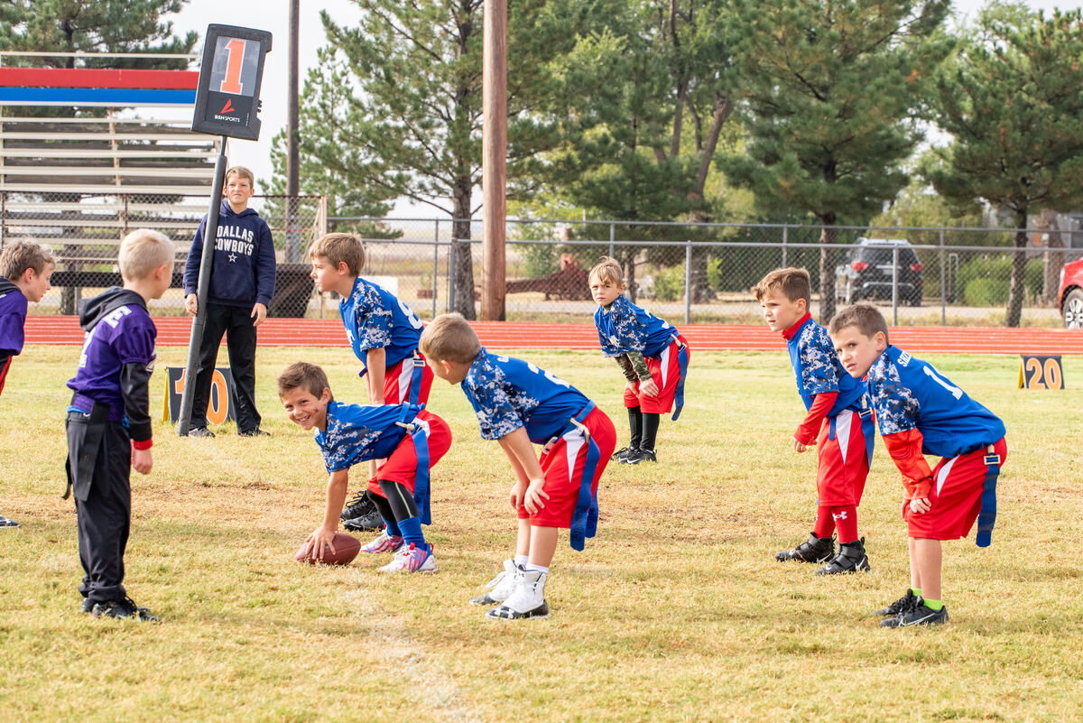 Flag football team lined up before the snap